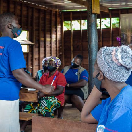 Learnmore Ndarera, leader of a Safe Space in Chimanimani women group talking to other women about the benefits of safe spaces 