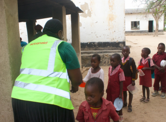 Sharara Primary School pupils receiving nutritious meals through AAZ's School Feeding Programme